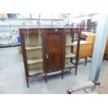 A MAHOGANY DISPLAY CABINET WITH CENTRE PANEL DOOR, FLANKED BY ELLIPTICAL GLAZED DOORS AND GLAZED