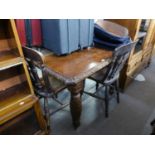 A VICTORIAN CARVED OAK EXTENDING DINING TABLE, RAISED ON CARVED BULBOUS LEGS AND A SET OF THREE