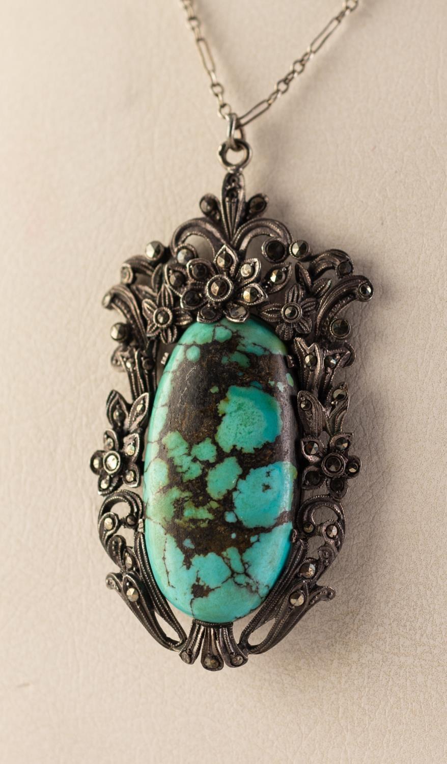 LARGE SILVER AND MARCASITE VINTAGE PENDANT set with a large cabochon oval turquoise in a marcasite - Image 2 of 2