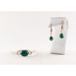 ISRAELI STERLING SILVER SPRUNG BANGLE, the top cavetto set with a cabochon oval malachite and a PAIR