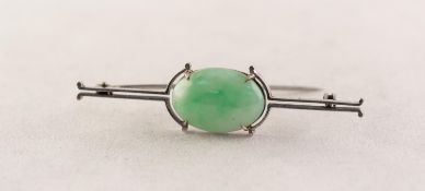 9ct WHITE GOLD BAR BROOCH set with cabochon oval green jade, 2 1/4in (5.75cm) wide, 4.4 gms
