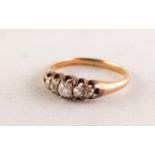 VICTORIAN GOLD COLOURED METAL RING with lozenge shaped claw setting of five graduated old cut