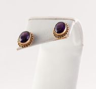 PAIR OF 9ct GOLD OVAL EARRINGS, each collet set with a faceted oval amethyst, 2.7gms