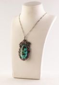 LARGE SILVER AND MARCASITE VINTAGE PENDANT set with a large cabochon oval turquoise in a marcasite