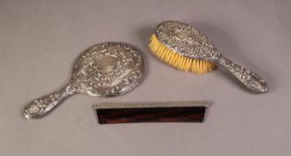 LADY'S SILVER DRESSING TABLE HAND MIRROR, repousse with rococo scrolls, Chester 1911; VICTORIAN