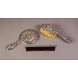 LADY'S SILVER DRESSING TABLE HAND MIRROR, repousse with rococo scrolls, Chester 1911; VICTORIAN