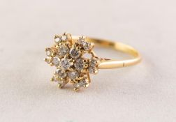 18ct GOLD AND DIAMOND 'SNOWFLAKE' CLUSTER RING set with nineteen small round brilliant cut