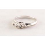 18ct WHITE GOLD AND THREE STONE DIAMOND RING, the centre round brilliant cut diamond approximately