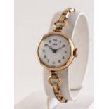 HIRCO LADY'S 9ct GOLD SWISS WRISTWATCH, with mechanical movement, white porcelain Arabic dial,