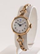 HIRCO LADY'S 9ct GOLD SWISS WRISTWATCH, with mechanical movement, white porcelain Arabic dial,