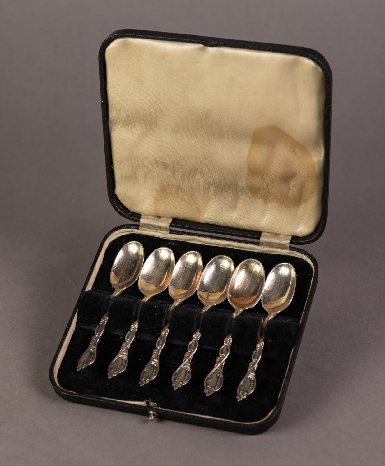 CASED SET OF SIX ELECTROPLATED TEA SPOONS with fancy handles, together with a QUANTITY OF LOOSE