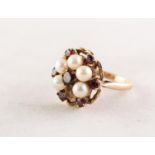 9ct GOLD, GARNET AND PEARL CIRCULAR CLUSTER RING, set with a small centre garnet surround of five