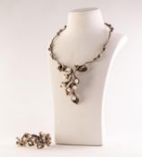 CRETAN SILVER COLOURED METAL AND PEARL SET NECKLACE AND MATCHING BRACELET, of lily plant foliate and