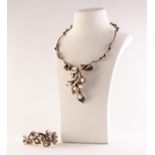 CRETAN SILVER COLOURED METAL AND PEARL SET NECKLACE AND MATCHING BRACELET, of lily plant foliate and