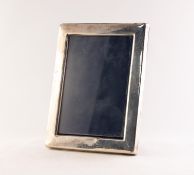 MODERN SILVER FRONTED DESK TOP PHOTOGRAPH FRAME, of plain oblong form with blue plush lined easel