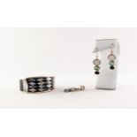 MEXICAN STERLING SILVER BROAD TORQUE BANGLE, with mother o'pearl diamond pattern on a black