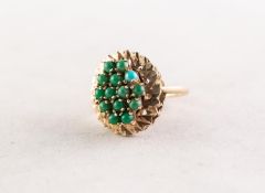 9ct GOLD AND TURQUOISE DRESS RING, the raised oval top set with a cluster of fourteen tiny