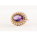 ATTRACTIVE VICTORIAN GOLD (unmarked) AMETHYST AND PEARL OVAL BROOCH with a centre large oval