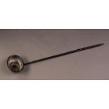 GEORGE III SILVER TODDY LADLE WITH TWISTED WALE BONE HANDLE, and coin set into the floral chased