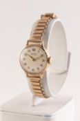 BUREN GRAND PRIX LADY'S 9ct GOLD WRISTWATCH with mechanical movement, circular silvered Arabic dial,