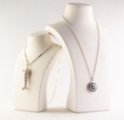 SILVER BELCHER CHAIN NECKLACE AND A MILLEFIORI DISC SHAPED PENDANT, in silver coloured metal