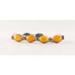 SILVER COLOURED METAL BRACELET with eight cabochon OVAL BUTTERSCOTCH AMBER set links (925 mark)