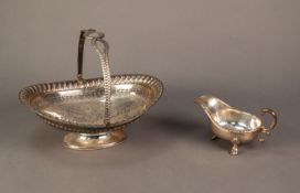 ELECTROPLATED SWING HANDLED CAKE BASKET BY WALKER & HALL, of oval footed form with engraved floral