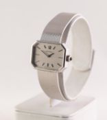 LADY'S OMEGA SWISS 9ct WHITE GOLD BRACELET WATCH with mechanical movement, the silvered oblong