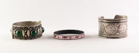 MICHAELA FREY, AUSTRIAN ENAMELLED METAL BANGLE  with an intricate pattern of alternate flowers and