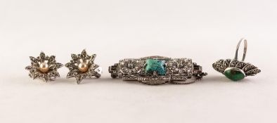 SILVER AND MARCASITE VINTAGE RING collet set with a cabochon oval turquoise and in a marquise shaped