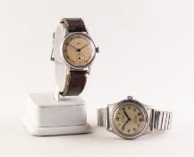 GENT'S AVIA SWISS VINTAGE WRISTWATCH with mechanical movement, Arabic circular champagen dial with