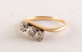 18ct GOLD CROSS-OVER RING set with three old cut diamonds, eah approximately 0.20ct, 0.60ct in