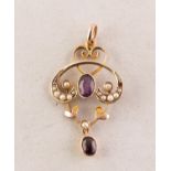 EDWARDIAN 9ct GOLD ART NOUVEAU C SCROLL AND FOLIATE OPEN WORK PENDANT with two collet set oval
