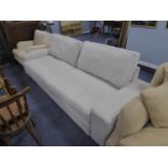 A LARGE MODERN BED SETTEE WITH PULL-OUT ACTION