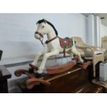 A TRIANG SHARNA TOYS BRONCO ROCKING HORSE, ON CURVED ROCKERS