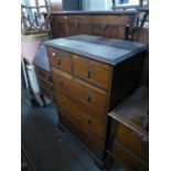 AN OAK JACOBEAN STYLE PART BEDROOM SUITE, VIZ A DRESSING CHEST WITH OVAL SWING MIRROR, A CHEST OF