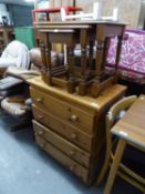 PINE CHEST OF FOUR DRAWERS HAVING KNOB HANDLES AND AN OAK NEST OF THREE COFFEE TABLES