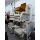 A WINGED LOUNGE  SUITE OF THREE PIECES, COVERED IN FLORAL AND STRIPED FABRIC, VIZ A TWO SEATER