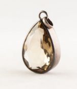 SILVER COLOURED METAL PENDANT, framing a large tear shaped citrine
