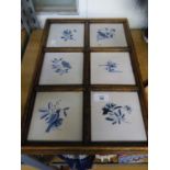 SET OF SIX OLD DELFT BLUE AND WHITE TILES, PAINTED WITH BIRDS AND FLOWERS OR INSECTS AND FLOWERS,