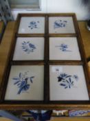 SET OF SIX OLD DELFT BLUE AND WHITE TILES, PAINTED WITH BIRDS AND FLOWERS OR INSECTS AND FLOWERS,