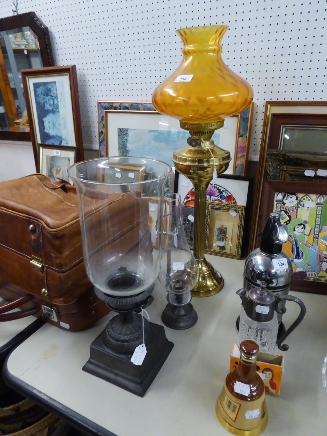 MODERN TALL BRASS OIL LAMP WITH FLUTED COLUMN, DOMED CIRCULAR FOOT, ORANGE GLASS SHADE, 25 1/2"