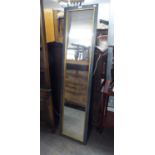 A ROBING MIRROR IN GREEN STAINED WOOD FRAME WITH GILT SLIP, 5'3" X 1'3"
