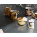 THREE EARLY TWENTIETH CENTURY ROYAL WORCESTER PORCELAIN BLUSHED IVORY GROUND MINIATURE ITEMS VIZ A