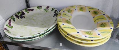 A PAIR OF ITALIAN LARGE CERAMIC PLATTERS, DECORATED WITH VEGETABLES (22" LONG) AND A SET OF THREE