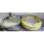 A PAIR OF ITALIAN LARGE CERAMIC PLATTERS, DECORATED WITH VEGETABLES (22" LONG) AND A SET OF THREE