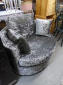 LARGE GREY PLUSH REVOLVING TUB SHAPED ARMCHAIR AND THE MATCHING HALF MOON FOOTSTOOL (2)