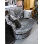 LARGE GREY PLUSH REVOLVING TUB SHAPED ARMCHAIR AND THE MATCHING HALF MOON FOOTSTOOL (2)