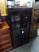 A MAHOGANY DWARF DISPLAY CABINET WITH TWO GLAZED DOORS, 2?1? WIDE