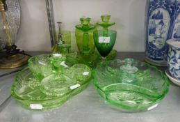 A GREEN GLASS MOULDED GLASS DRESSING TABLE SET OF FIVE PIECES AND A SIMILAR PAIR OF TALL